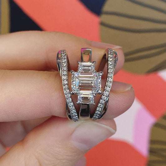 Three Stone Emerald Cut Diamond Ring